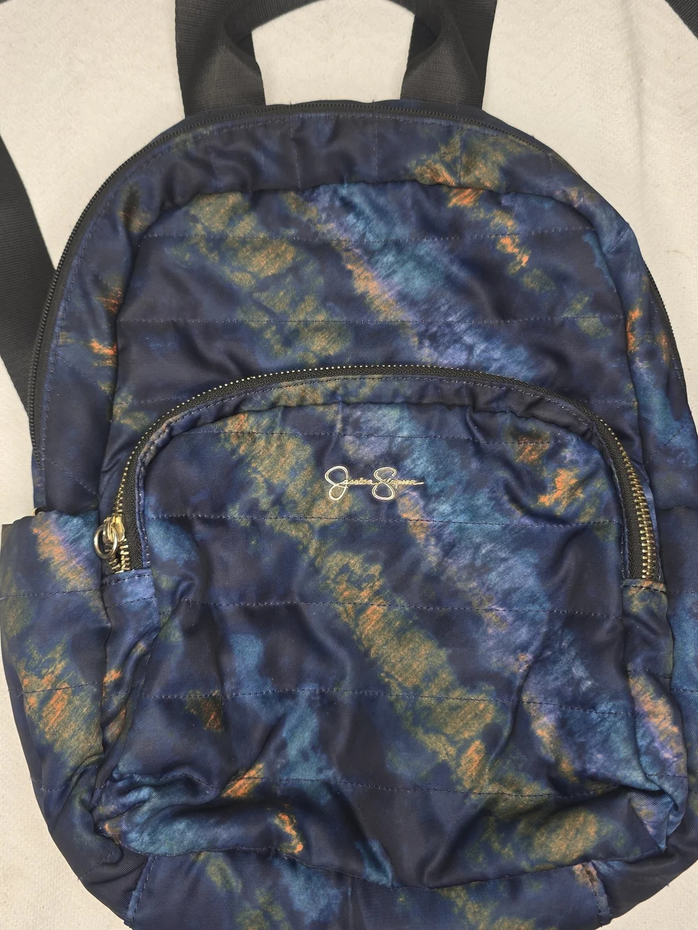 Jessica Simpson Blue and Gold Tie-Dye Quilted Backpack